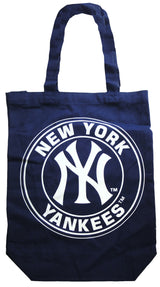 A close up of a Blue Yankees tote bag with NEW York Yankees written in white across a circle and the Yankees Logo in the middle