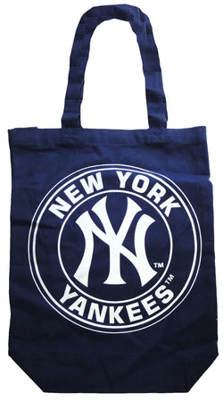 A close up of a Blue Yankees tote bag with NEW York Yankees written in white across a circle and the Yankees Logo in the middle