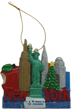 A Christmas Ornament showcasing famous landmarks from New York City, like the statue of liberty, the Empire State Building, and the famous New York skyline. On the bottom is written New York.