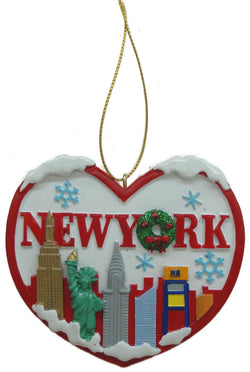This Christmas ornament is New York themed, with famous landmarks like the empire state building and the statue of liberty, with New York written in the background. All in a heart shaped Christmas ornament.