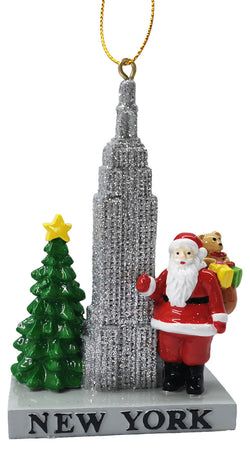 Gorgeous 3D Christmas Ornament featuring the Empire State building with glitter on it, Santa Claus and a Christmas tree.