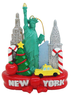 This beautiful Christmas ornament features famous monuments from New York city like the statue of liberty, the Christler building and New York yellow cab. The ornament is in 3D and is embellished with glitter.
